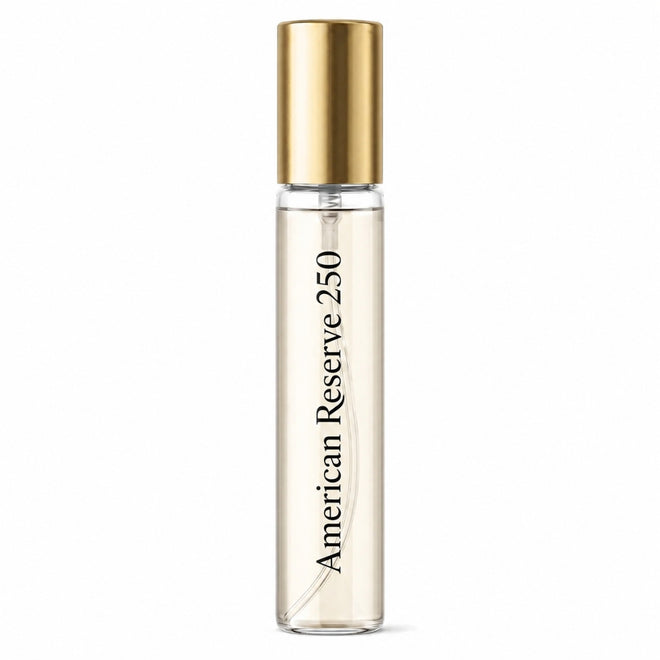 A clear cylindrical roller bottle with a metallic gold cap, containing a pale beige liquid. The bottle is labeled with the text 'American Reserve 250' in black font, set against a plain white background.