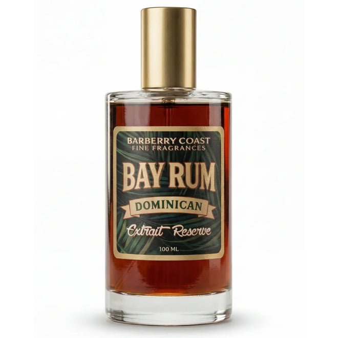 A 100ml glass bottle of Bay Rum Dominican Extract Reserve fragrance by Barberry Coast Fine Fragrances, featuring amber liquid, a gold cap, and a dark green and gold label.