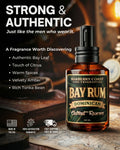 Barberry Coast Bay Rum Dominican Extrait Reserve men's cologne in 60ml amber glass bottle with black spray pump, featuring authentic bay leaf, citrus, warm spices, velvety amber, and rich tonka bean fragrance notes, made in USA