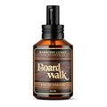 Perfume bottle labeled 'Board Walk' by Barberry Coast on a white background