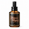 Finca Vigia Eau de Perfume Cologne bottle by Barberry Coast. Standard 2oz clear amber-colored apothecary bottle with a black atomizer sprayer cap. Lookout home in Havana, Cuba.