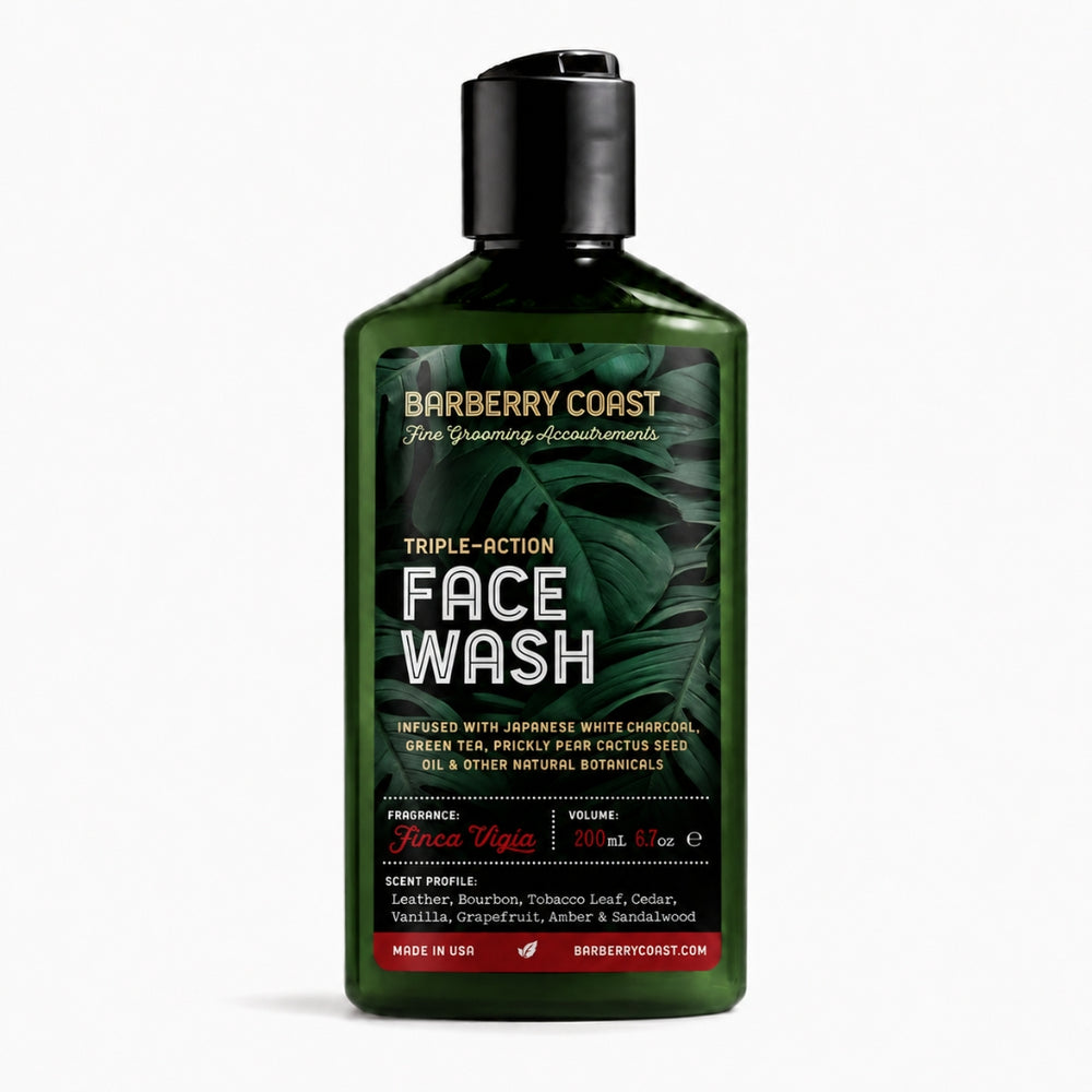 A dark green bottle of Barberry Coast Triple-Action Face Wash with a black cap, set against a plain white background.