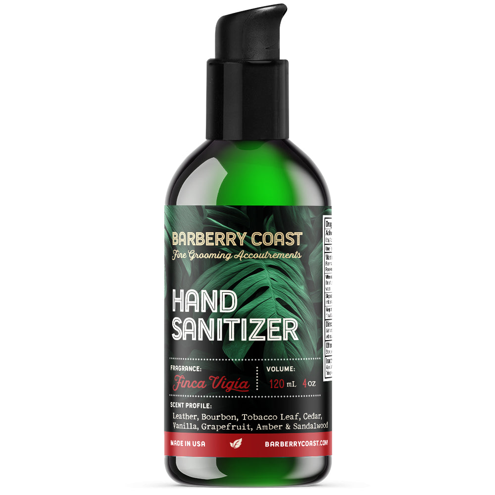 Green hand sanitizer bottle with black pump on a white background Finca Vigia