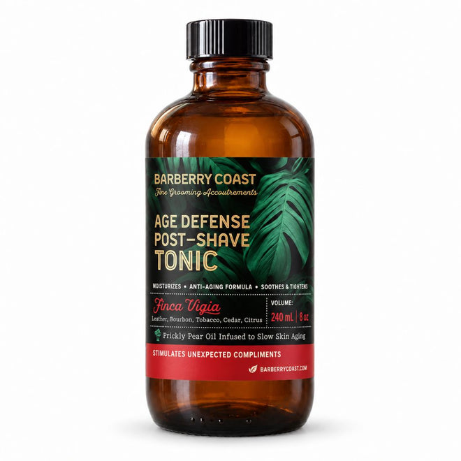 Barberry Coast Finca Vigía Age Defense Tonic in an 8 oz amber Boston round bottle with a black cap, green tropical-leaf label and red band, on a white background.