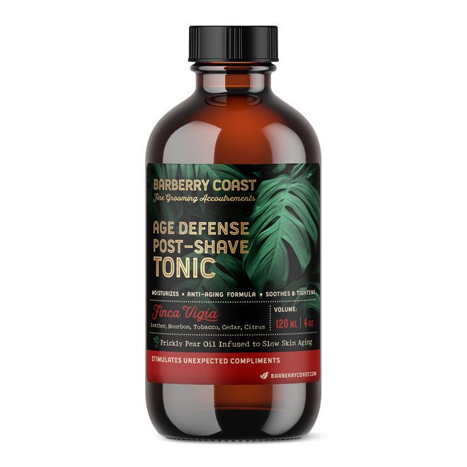 Age Defense Aftershave tonic bottle with a label featuring a green leafy design and the name 'Finca Vigía'. 4 ounce. Ernest Hemingway. The cap is black, and the liquid inside is clear. Barberry Coast