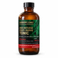 Barberry Coast Havana Age Defense Tonic in an 8 oz amber Boston round bottle with a black cap, broad green-leaf label and red band, on a white background.