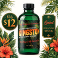 A 4 oz green glass bottle of Kingston Aftershave Splash from Barberry Coast Shave Co., surrounded by tropical leaves and flowers, with promotional badges indicating a $12 offer and limited remaining stock.