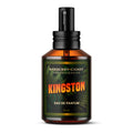 Kingston Eau de Parfum Cologne - a 2 ounce clear glass cologne bottle with gold atomizer spray cap and green label with text "Barberry Coast Fine Fragrances - Kingston Eau de Parfum" on a white background