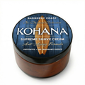 A jar of Kohana Supreme Shave Cream from Barberry Coast Shave Co. with a blue label, indicating it is unscented and has anti-aging properties.