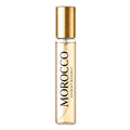Morocco Extract Reserve perfume rollerball bottle with a gold cap and clear glass body showing the golden liquid inside, set against a plain white background.