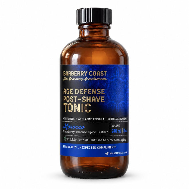 Barberry Coast Morocco Age Defense Tonic in an 8 oz amber Boston round bottle with a black cap, rich blue patterned label and gold lettering, on a white background.