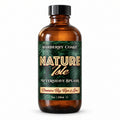 A 8 fl oz amber glass bottle of Barberry Coast Nature Isle Aftershave Splash with a black cap, featuring a dark green tropical leaf label with gold lettering, on a white background.