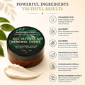 A cosmetic product tin labeled Barberry Coast Age Defense & Renewal Crème sits on a cream smear with decorative text and ingredient callouts around it. The tin is dark brown with a green-and-black label, and the surrounding design highlights hyaluronic acid, acai berry, goji berry, watermelon extract, pomegranate sterols, and Indian gooseberry extract.