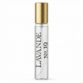 Clear perfume bottle with gold cap labeled 'Lavande No. 19' on a white background