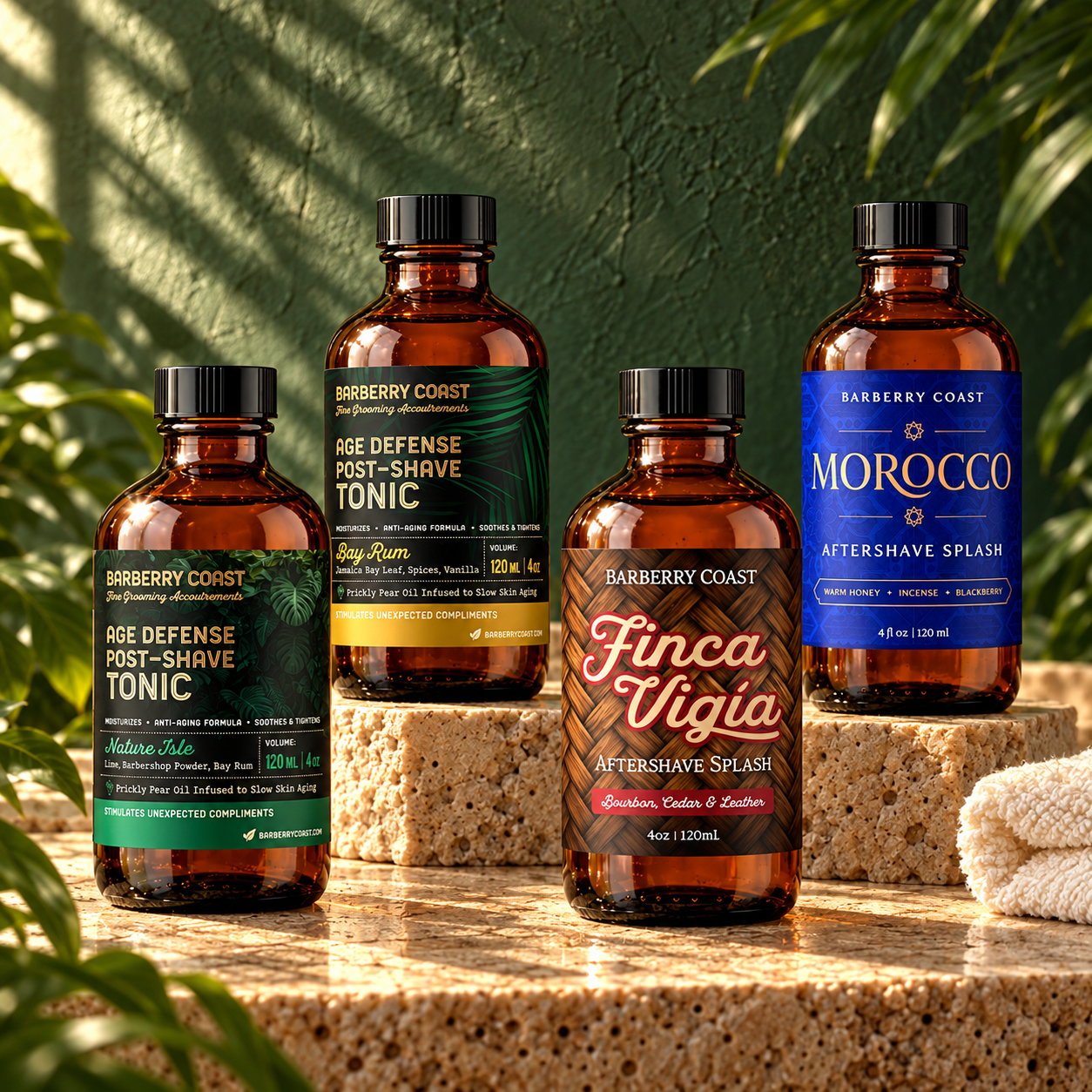 Four 4 oz Barberry Coast aftershave splashes and post-shave tonics on warm stone
